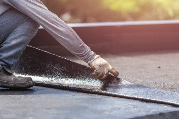 Professional Waterproofing technician working in Oakwood, GA